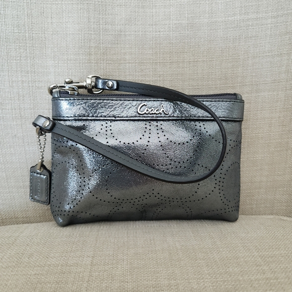 Coach Metallic Silver Gray Eyelet Wristlet - Picture 1 of 15